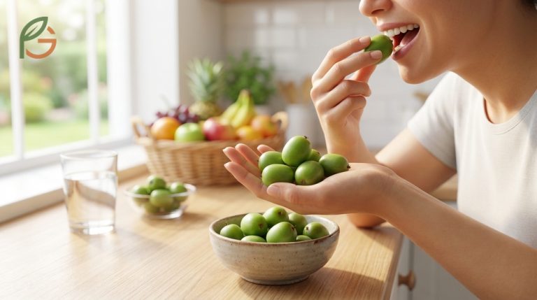 How to eat kiwi berries guide demonstrating that these smooth fruits are eaten whole like grapes without peeling.