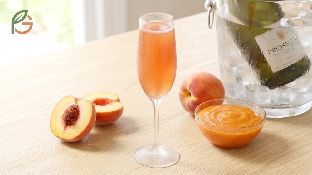 What is in a peach bellini showing fresh white peach puree and chilled Italian sparkling wine.
